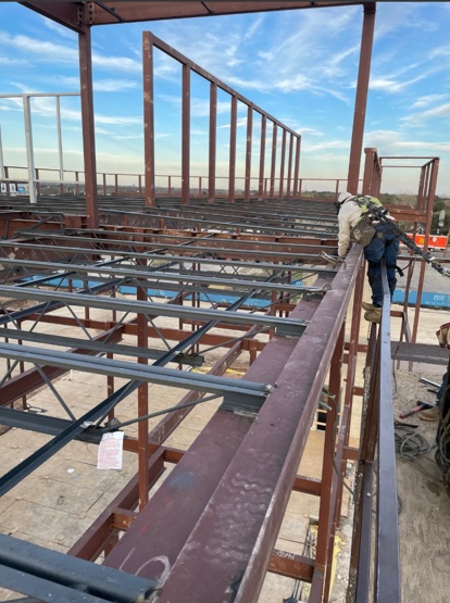 Structural steel beams and columns erected to plan